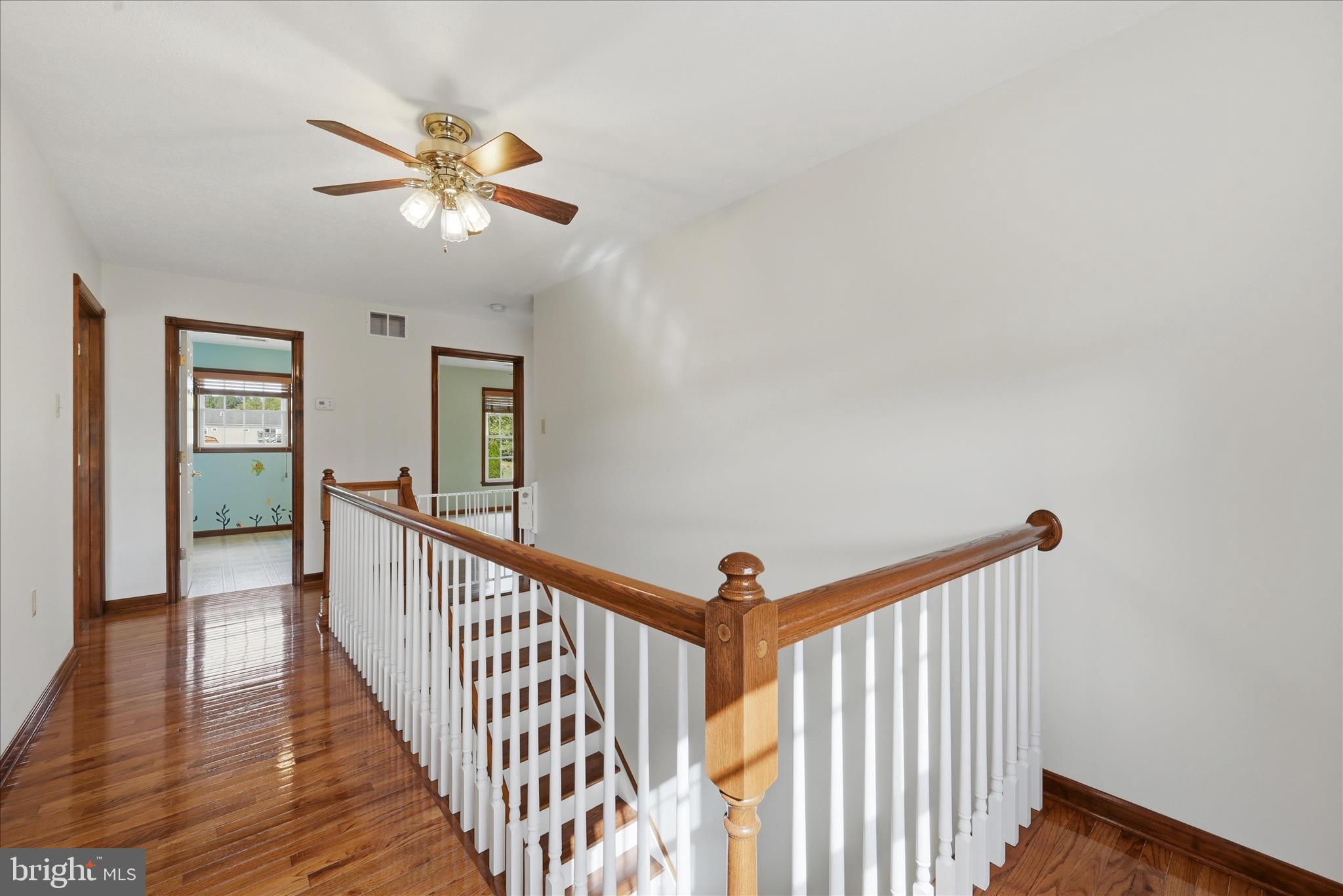 412 Ruebuck Road Clear Brook, VA 22624 - Photo 17 of 43 a view of a hallway with wooden floor and staircase