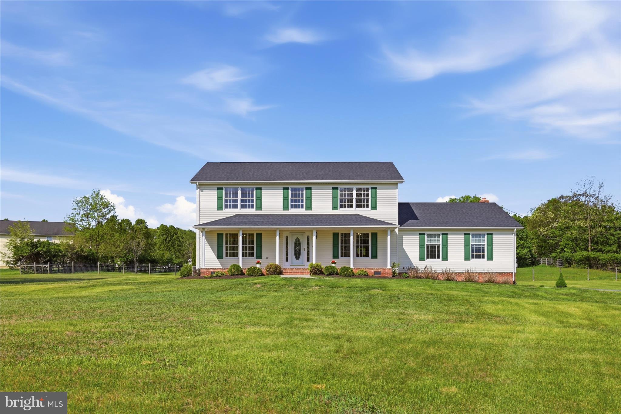412 Ruebuck Road Clear Brook, VA 22624 - Photo 2 of 43 a front view of a house with garden