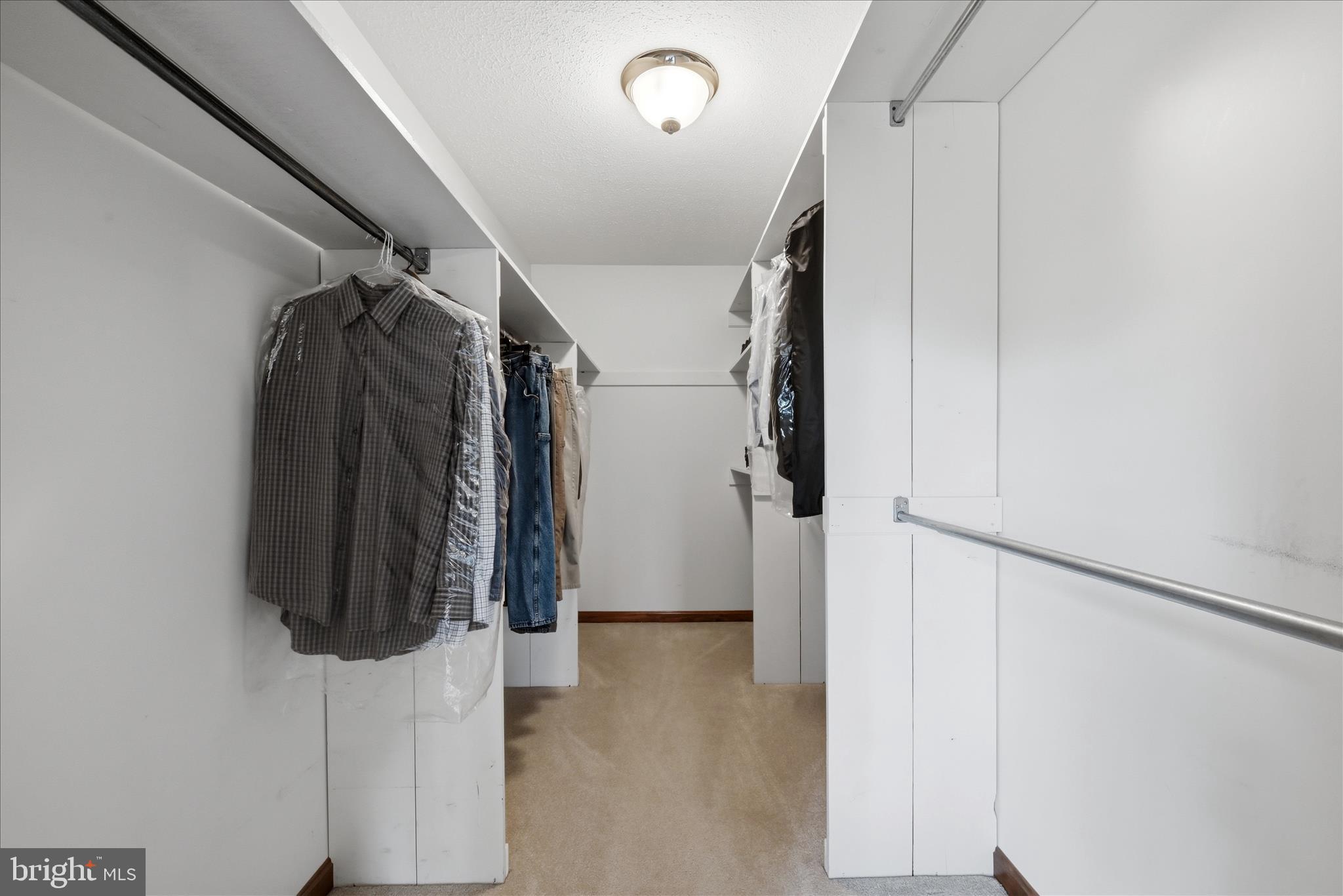 412 Ruebuck Road Clear Brook, VA 22624 - Photo 22 of 43 a view of walk in closet with clothes and shoes