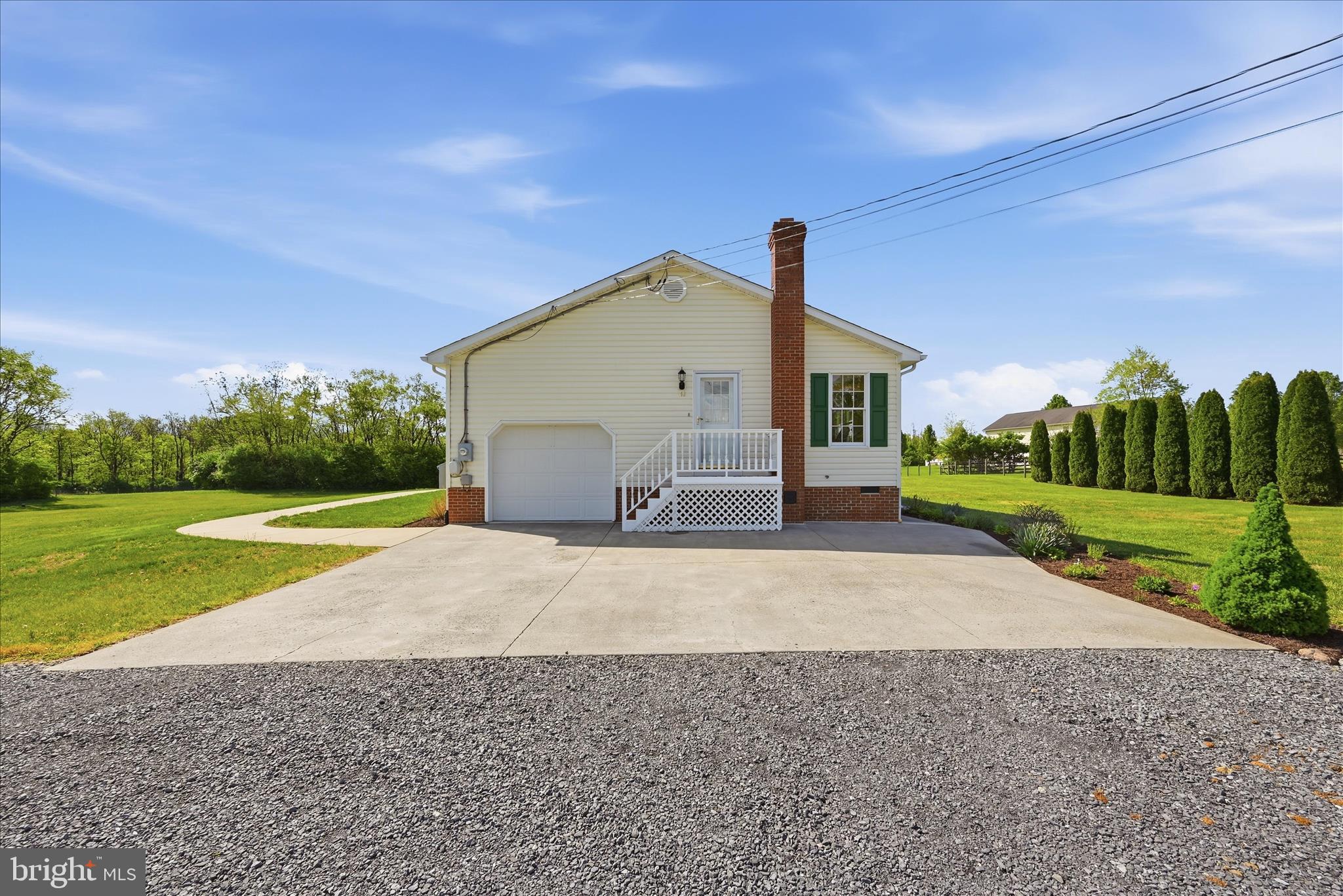 412 Ruebuck Road Clear Brook, VA 22624 - Photo 29 of 43 a view of a house with backyard and bushes