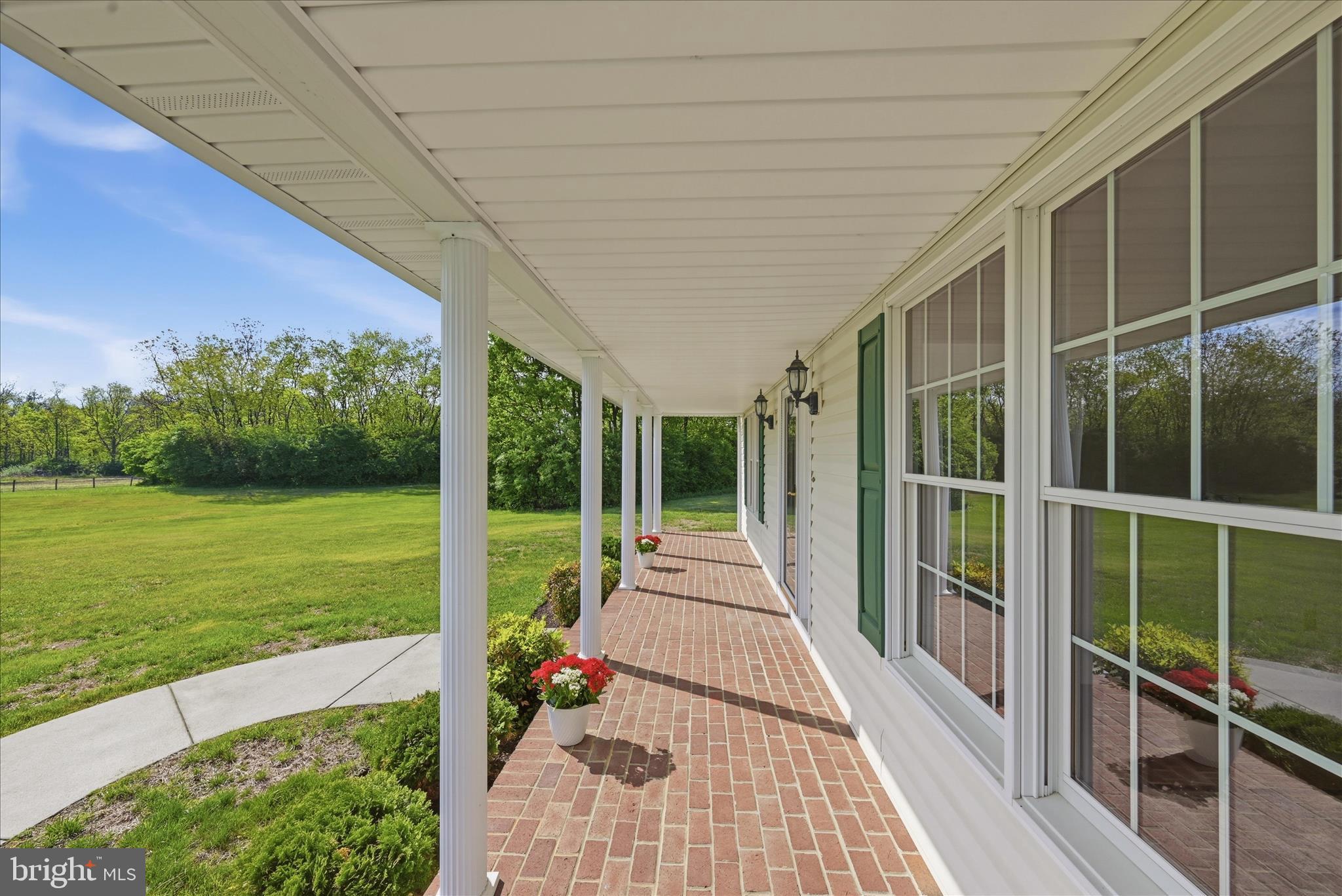412 Ruebuck Road Clear Brook, VA 22624 - Photo 3 of 43 a view of a porch with garden