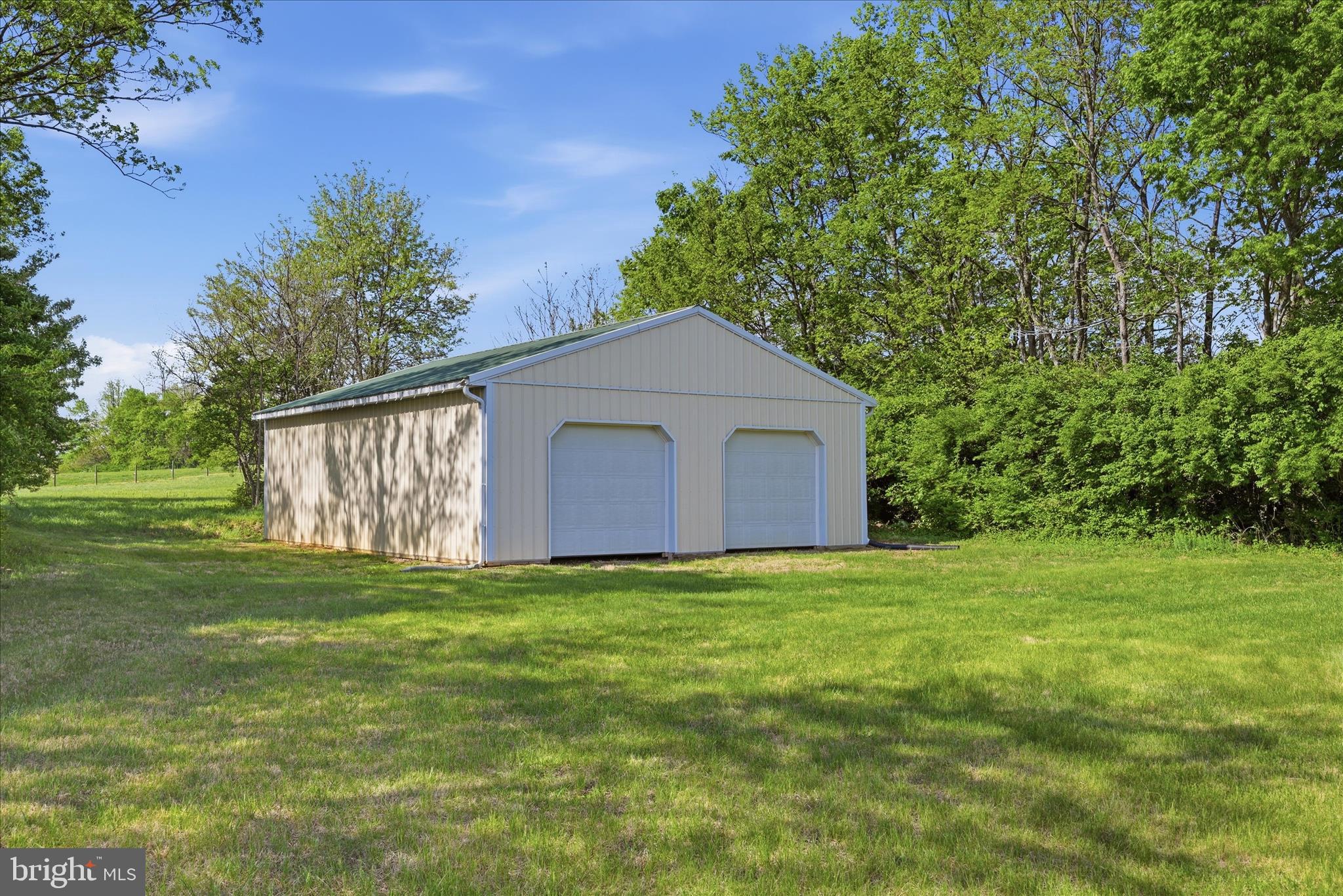 412 Ruebuck Road Clear Brook, VA 22624 - Photo 31 of 43 a front view of a house with garden