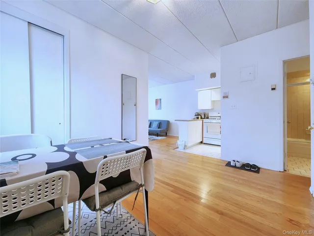 a bedroom with a bed and a table in it