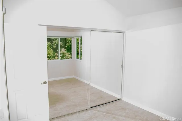 a picture of a bathroom with a shower