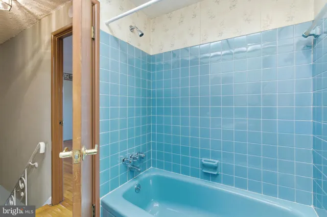 a bathroom with a bathtub