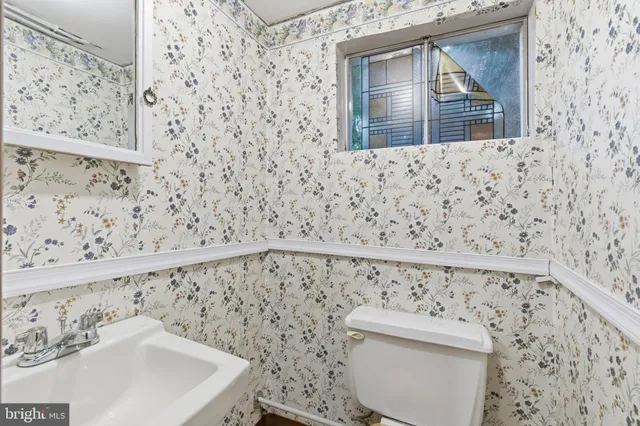 a bathroom with a sink and a toilet