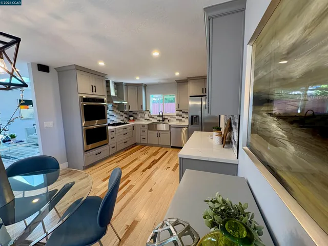 a view of a living room and dining room