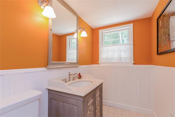 62 Moore Road Wayland, MA 01778 - Photo 18 of 22 a bathroom with a sink a vanity and a toilet