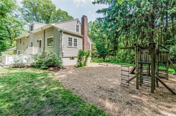 62 Moore Road Wayland, MA 01778 - Photo 21 of 22 a view of a house with a yard and sitting area