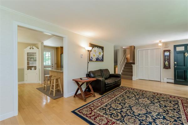 62 Moore Road Wayland, MA 01778 - Photo 3 of 22 a living room with furniture and a rug