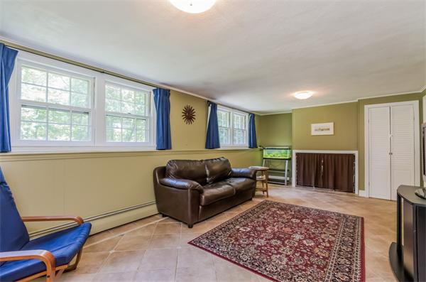 62 Moore Road Wayland, MA 01778 - Photo 9 of 22 a living room with furniture and a rug