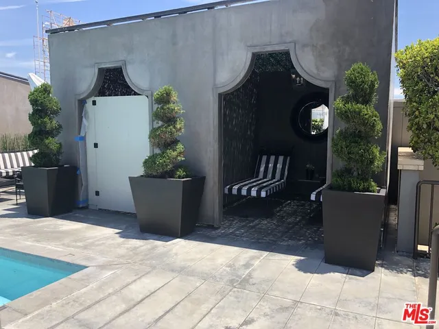a kitchen with a stove and a refrigerator