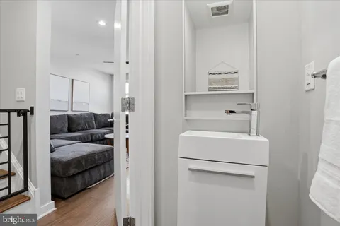 a bedroom with a bed and a table in it