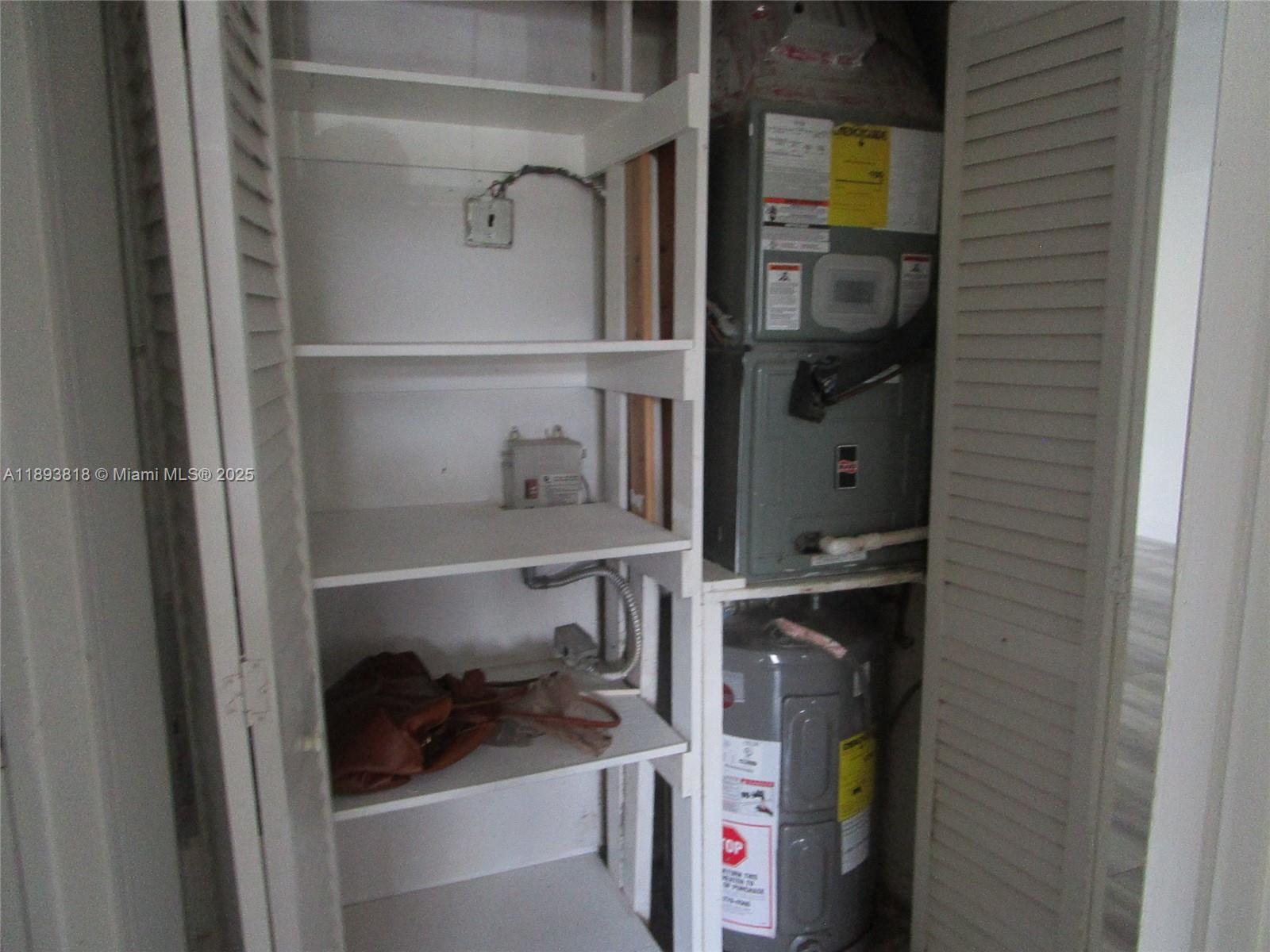 8101 Southwest 24th Court, Unit 206 Davie, FL 33324 - Photo 17 of 41 a room with storage and utility