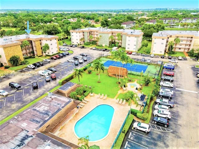 aerial view of a swimming pool and outdoor space