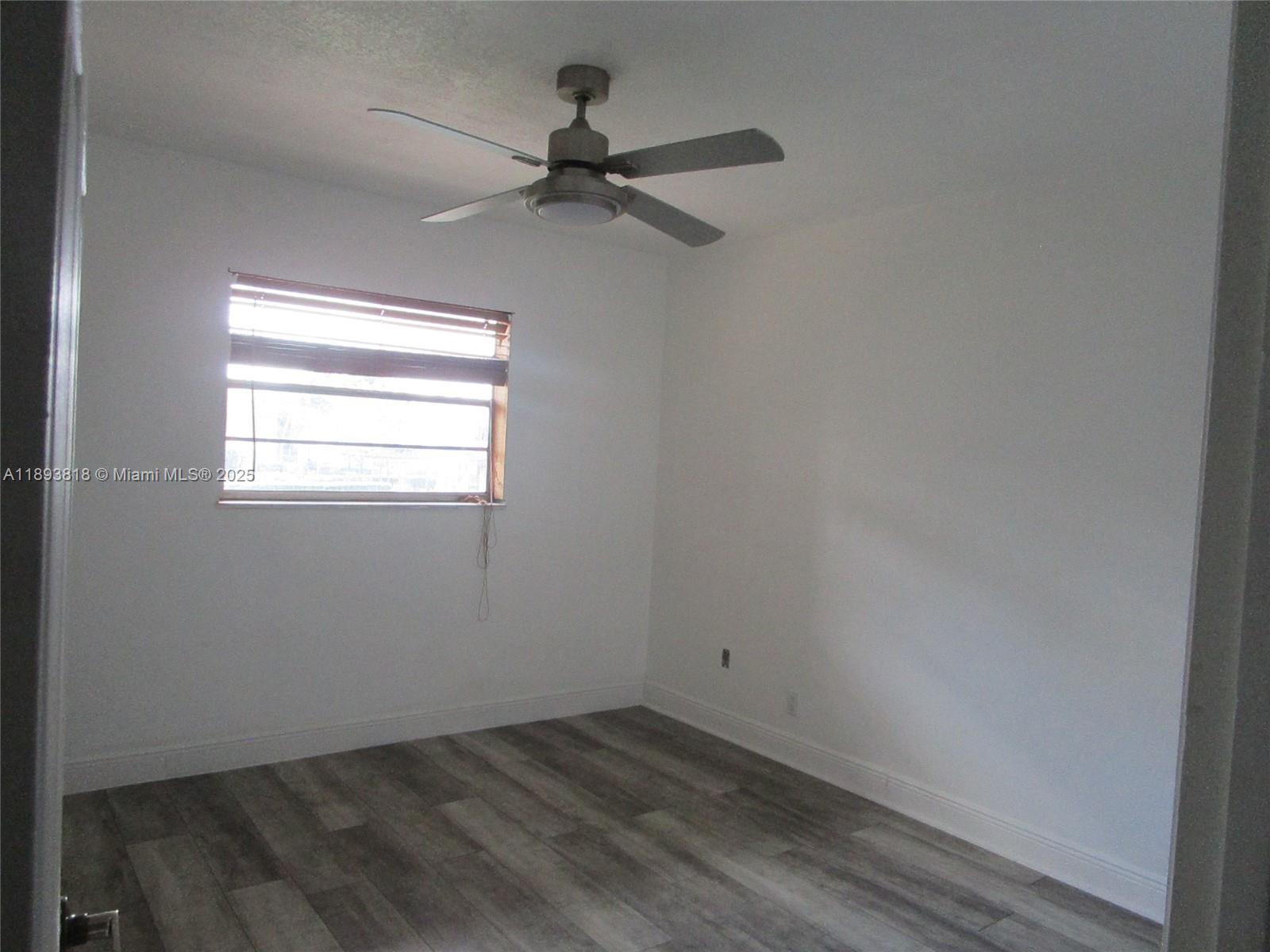 8101 Southwest 24th Court, Unit 206 Davie, FL 33324 - Photo 21 of 41 an empty room with a window