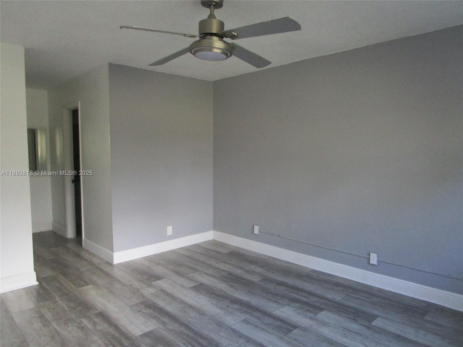 8101 Southwest 24th Court, Unit 206 Davie, FL 33324 - Photo 28 of 41 wooden floor in an empty room