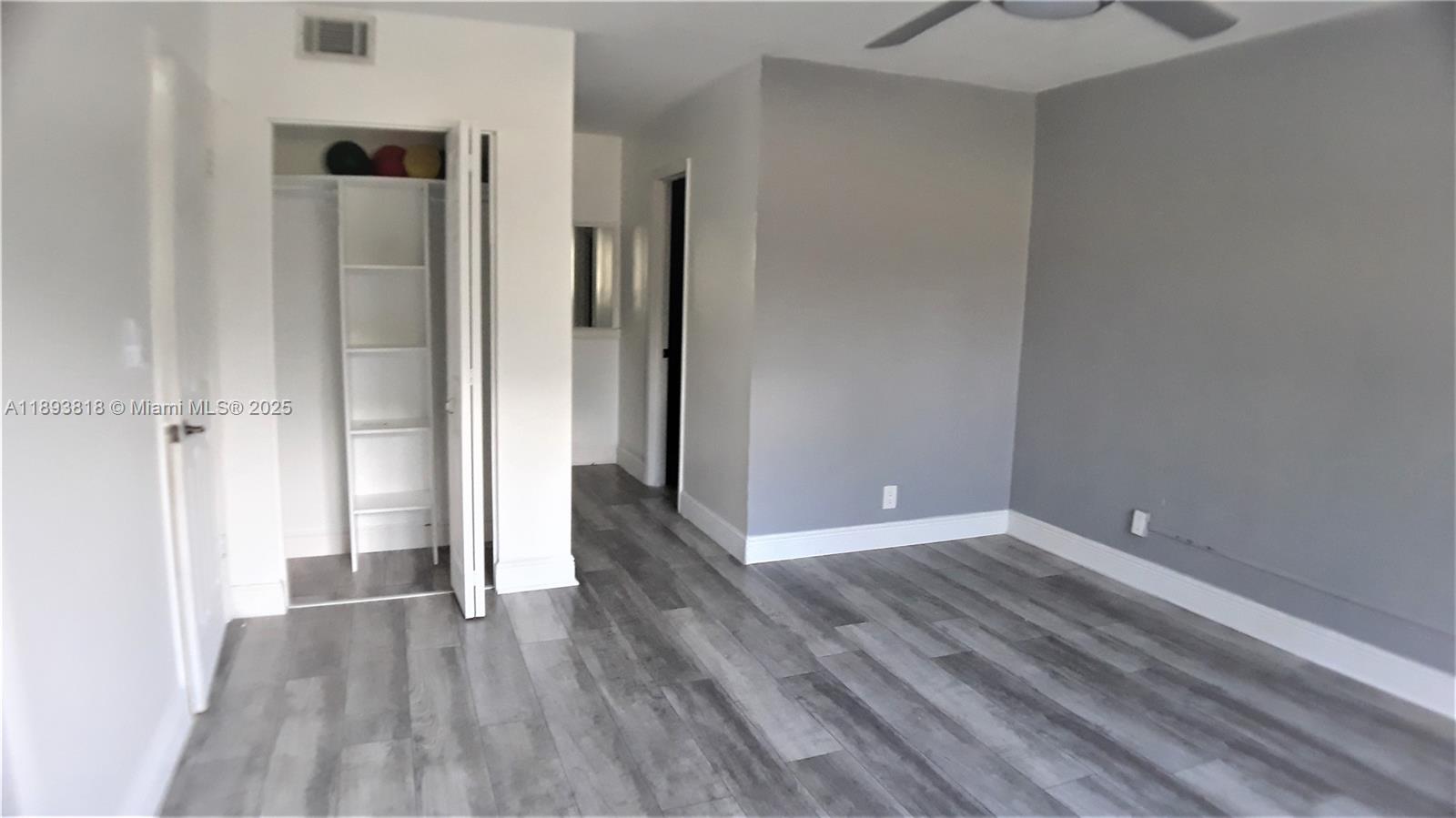 8101 Southwest 24th Court, Unit 206 Davie, FL 33324 - Photo 29 of 41 wooden floor in an empty room