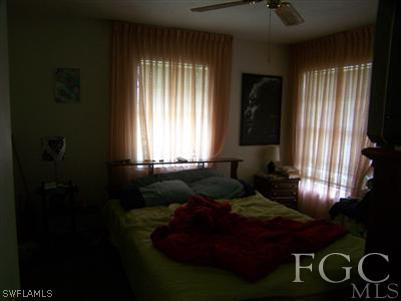 1602 Ridgecrest Street Lehigh Acres, FL 33936 - Photo 9 of 12 a living room with furniture