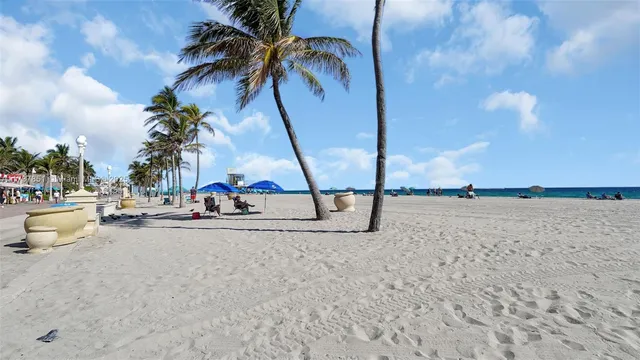 an aerial view of a house with a ocean view
