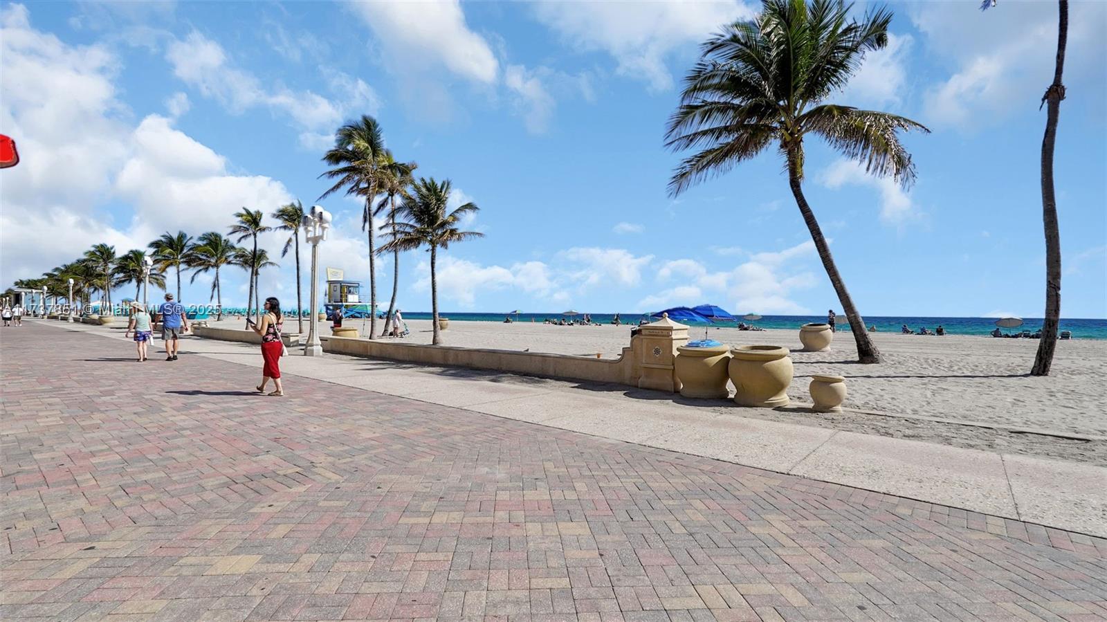 322 Buchanan Street, Unit 907 Hollywood, FL 33019 - Photo 40 of 45 a view of a park with swings and slides