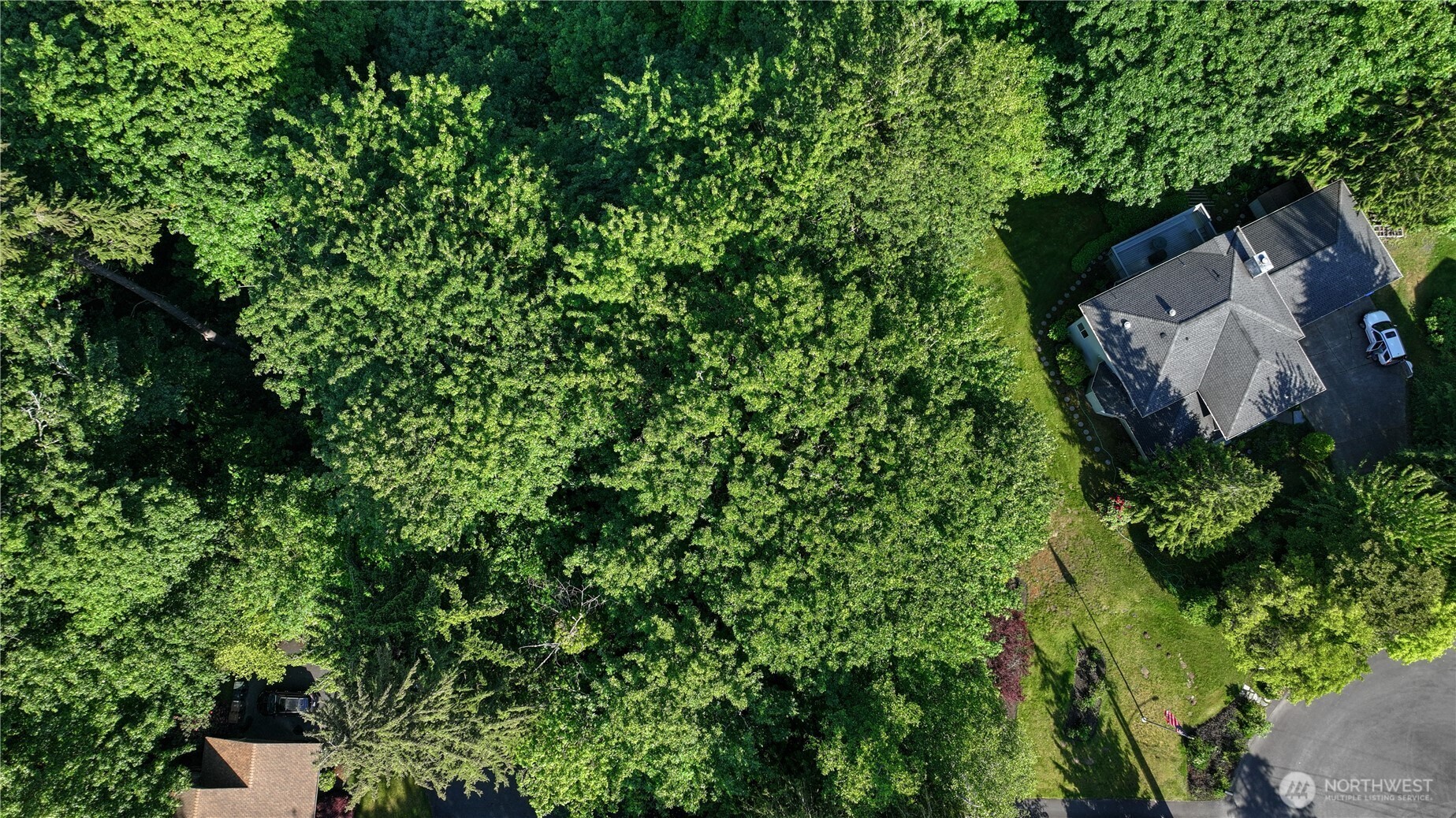 0 Agnes Road Northeast Tacoma, WA 98422 - Photo 19 of 21 an aerial view of a house with a yard