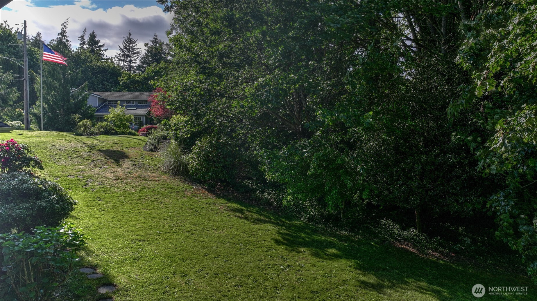 0 Agnes Road Northeast Tacoma, WA 98422 - Photo 21 of 21 a view of a big yard with plants and large trees