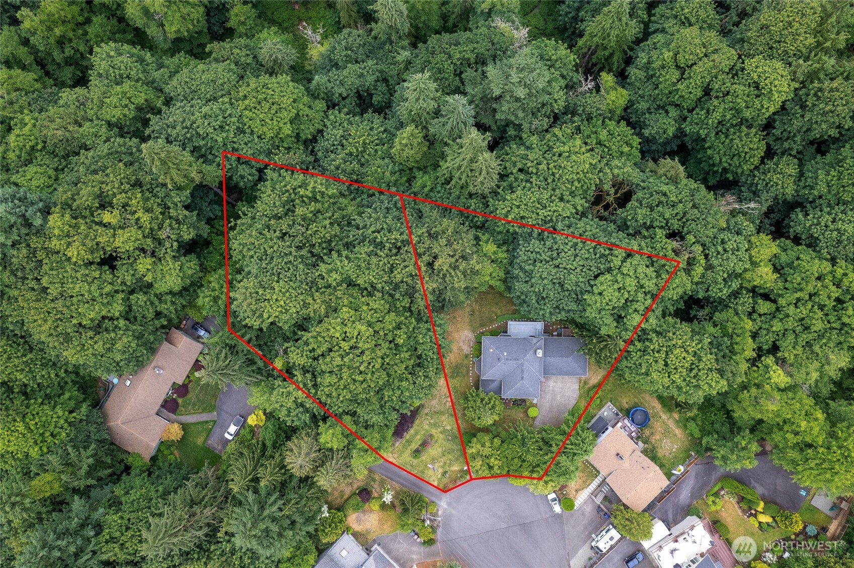 0 Agnes Road Northeast Tacoma, WA 98422 - Photo 3 of 21 an aerial view of a house with a yard and outdoor seating