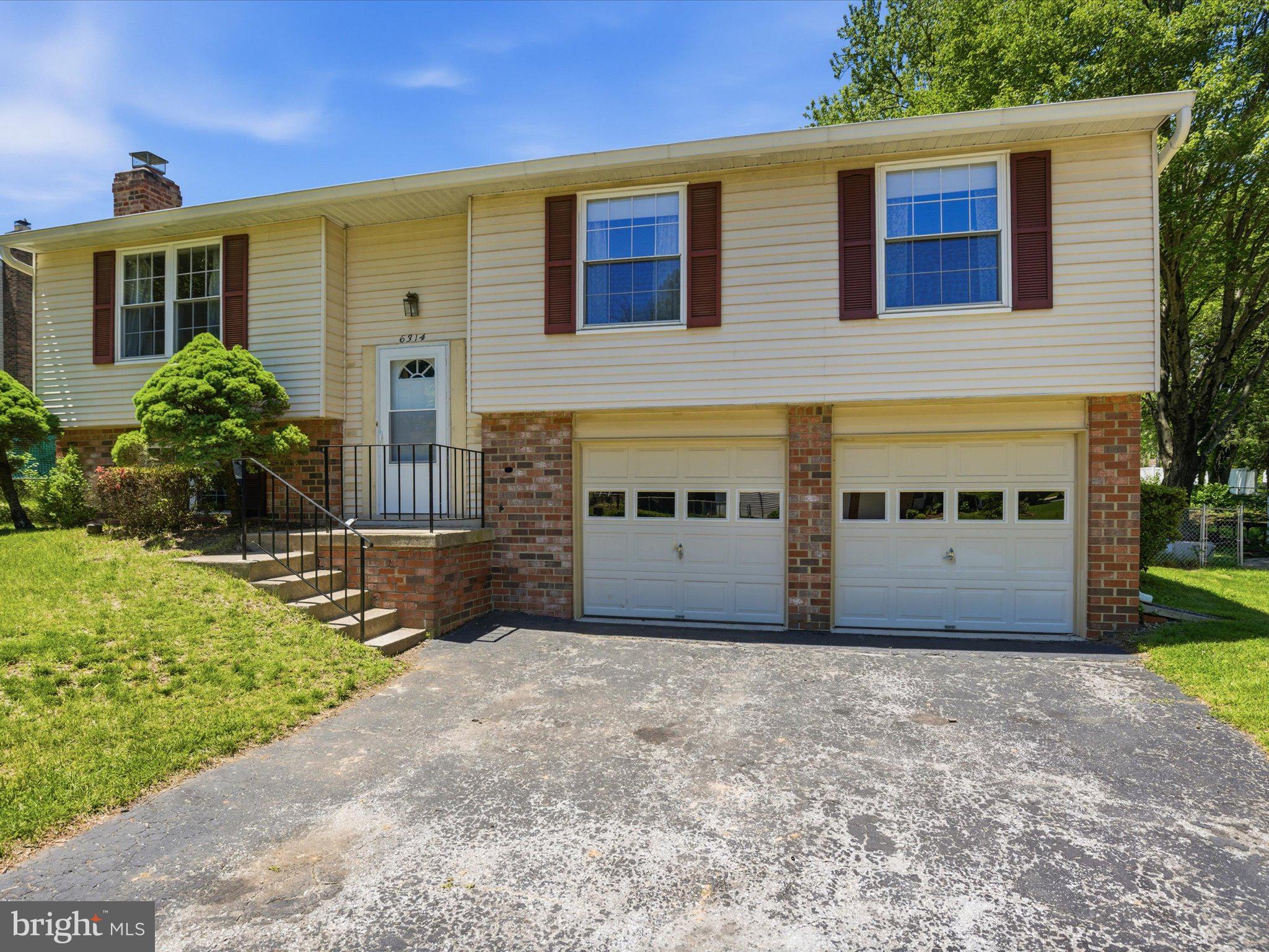6314 West Vein Road Bowie, MD 20720 - Photo 1 of 28 a front view of house with yard