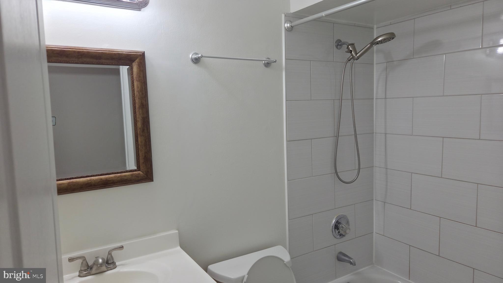 8387 Montgomery Run Road, Unit E Ellicott City, MD 21043 - Photo 25 of 25 hallway bathroom