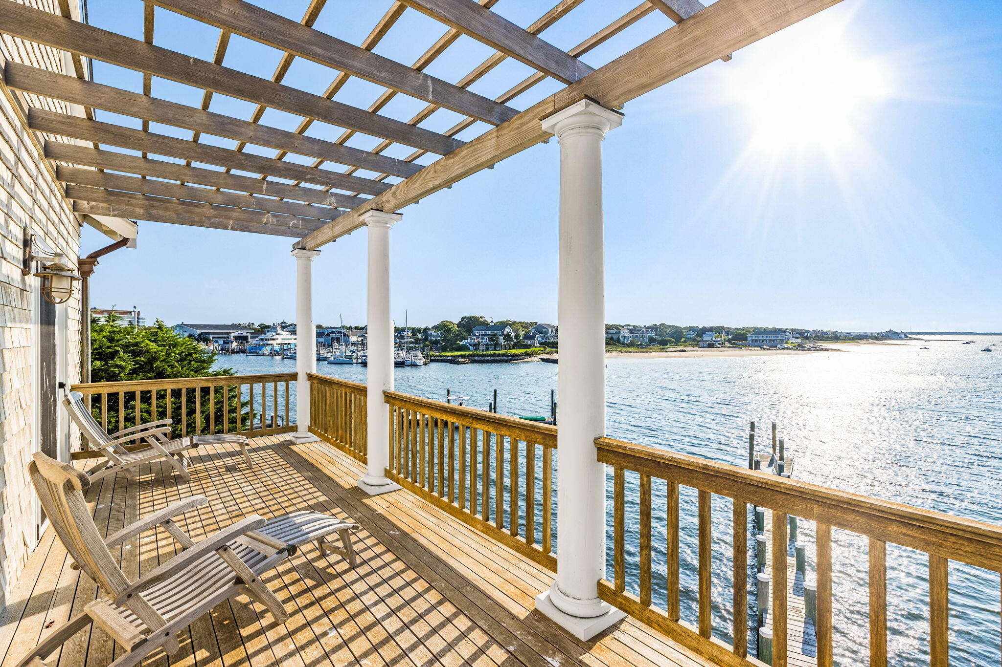 20 Bay Shore Road Hyannis, MA 02601 - Photo 37 of 42 a view of a balcony with lake view and wooden floor