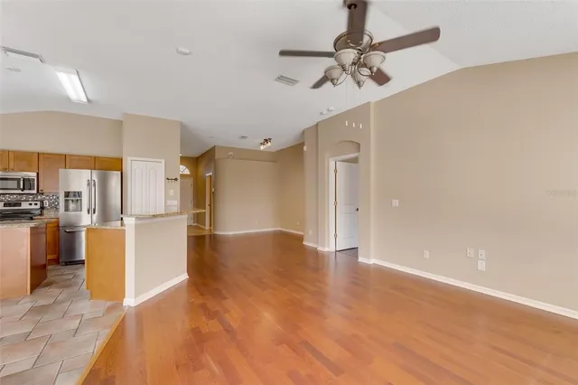 a view of an empty room with a window