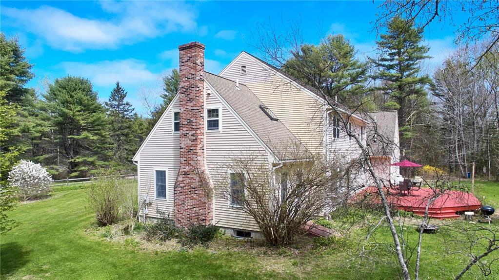 57 Pine Ridge Road Damariscotta, ME 04543 - Photo 6 of 35 The living room is at the far end of...