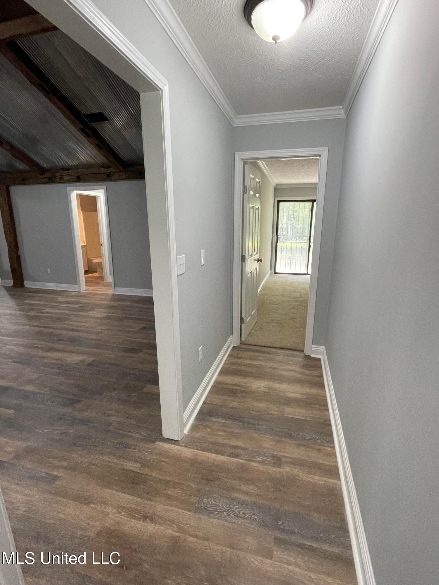 324 Bridgeport Road Pinola, MS 39149 - Photo 21 of 45 Hallway to master Bdrm