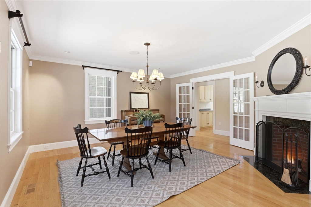 138 Judge Cushing Road Scituate, MA 02066 - Photo 13 of 40 a view of a dining room with furniture window and wooden floor
