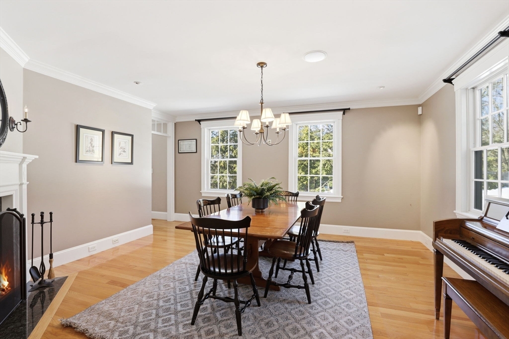 138 Judge Cushing Road Scituate, MA 02066 - Photo 14 of 40 a view of a dining room with furniture window and wooden floor