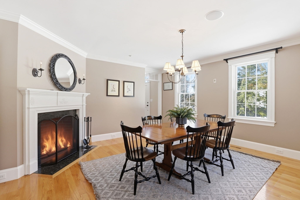 138 Judge Cushing Road Scituate, MA 02066 - Photo 15 of 40 a view of a dining room with furniture window and wooden floor