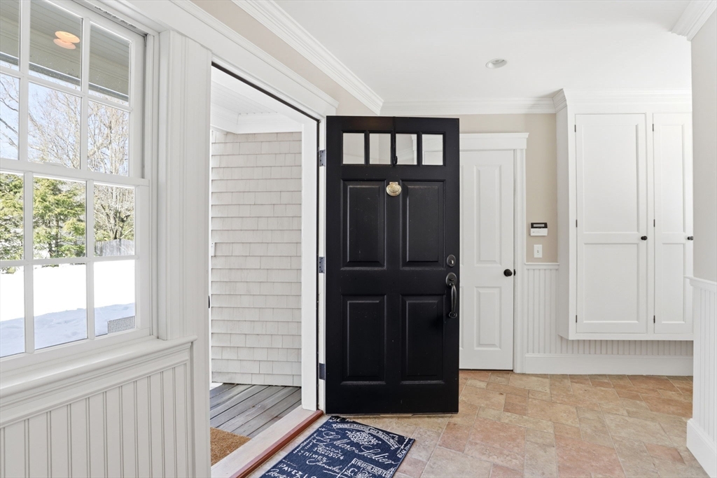 138 Judge Cushing Road Scituate, MA 02066 - Photo 16 of 40 a view of front door with wooden floor