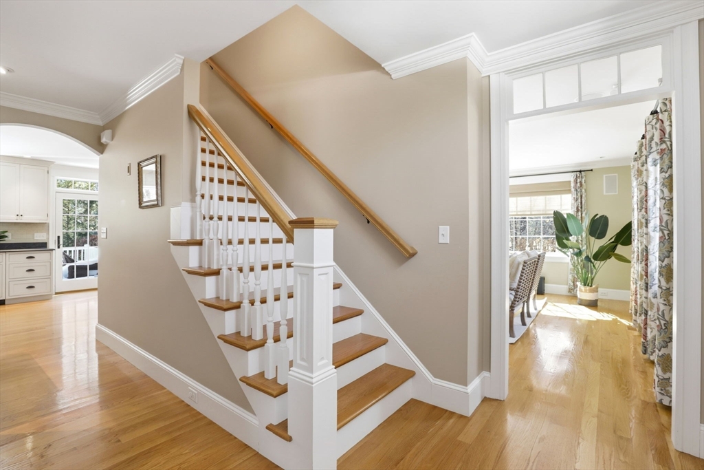 138 Judge Cushing Road Scituate, MA 02066 - Photo 18 of 40 a view of entryway and hall with wooden floor