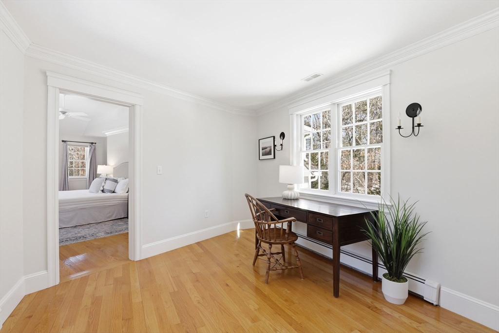 138 Judge Cushing Road Scituate, MA 02066 - Photo 23 of 40 a view of a livingroom with furniture and a potted plant