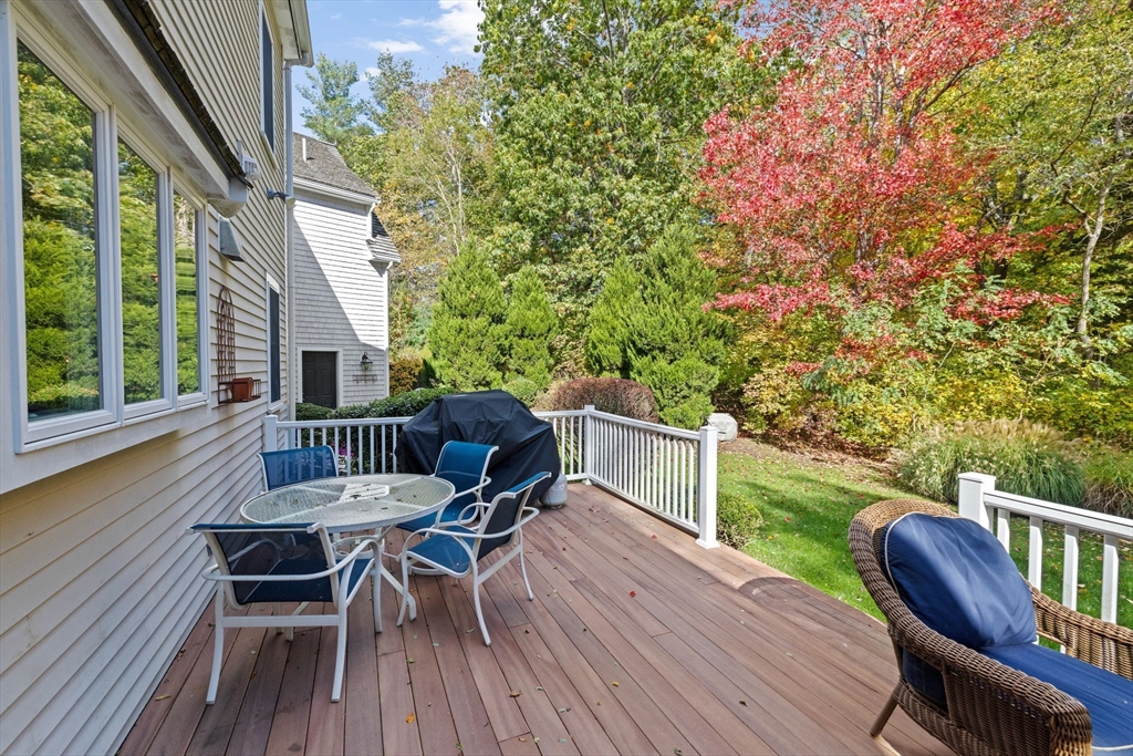 138 Judge Cushing Road Scituate, MA 02066 - Photo 30 of 40 a view of a chairs and table on the wooden floor