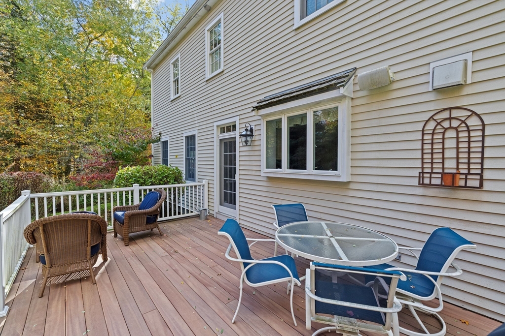 138 Judge Cushing Road Scituate, MA 02066 - Photo 31 of 40 a view of a chair and table on the deck