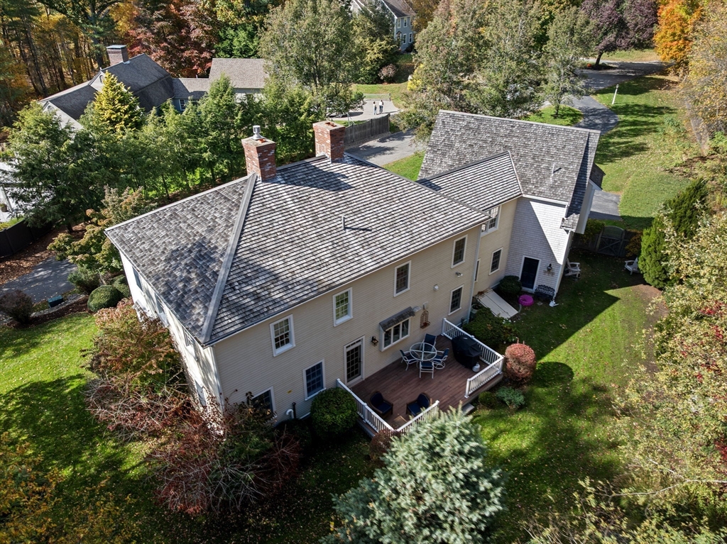 138 Judge Cushing Road Scituate, MA 02066 - Photo 33 of 40 an aerial view of a house with porch and furniture