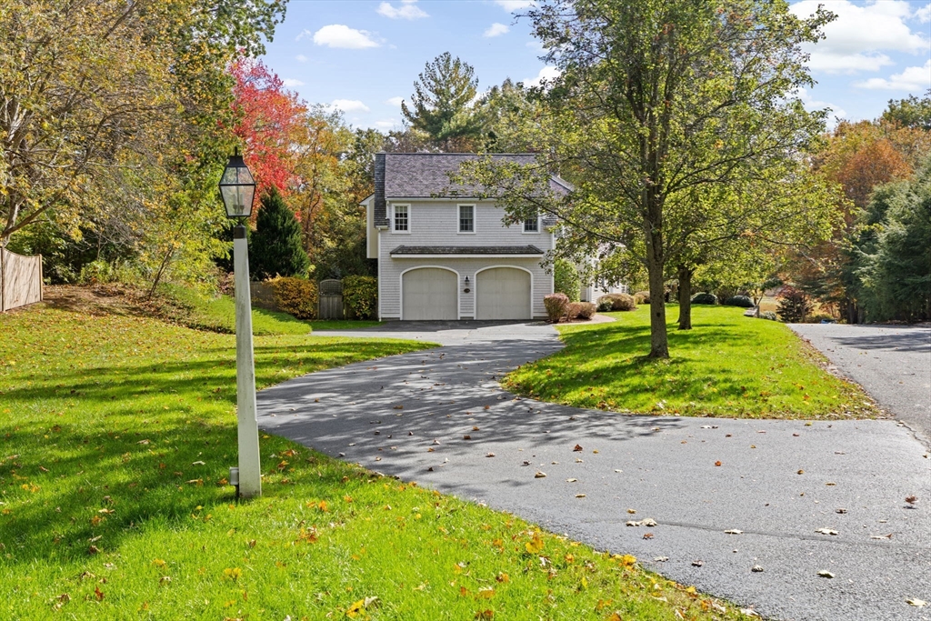 138 Judge Cushing Road Scituate, MA 02066 - Photo 37 of 40 a view of a house with a yard