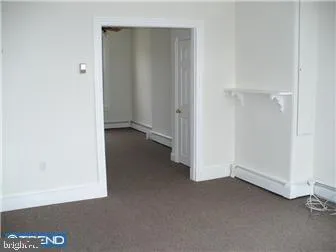 an empty room with a door