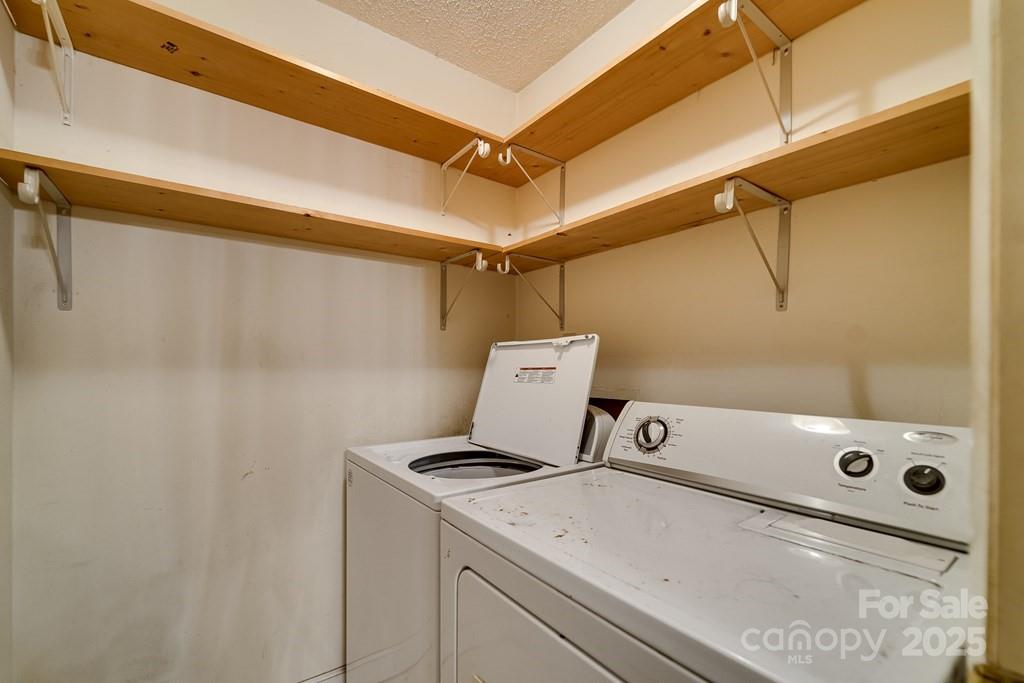 302 Mitchell Road Sylva, NC 28779 - Photo 12 of 48 a utility room with dryer and washer