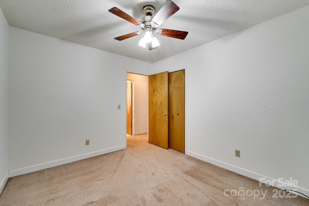 302 Mitchell Road Sylva, NC 28779 - Photo 20 of 48 a view of an empty room
