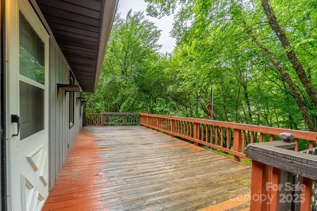 302 Mitchell Road Sylva, NC 28779 - Photo 31 of 48 a terrace view with two chairs and wooden fence
