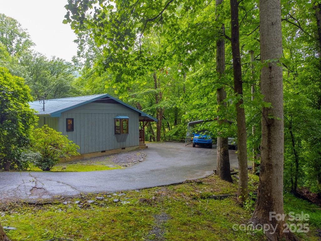 302 Mitchell Road Sylva, NC 28779 - Photo 37 of 48 a view of outdoor space yard and swimming pool