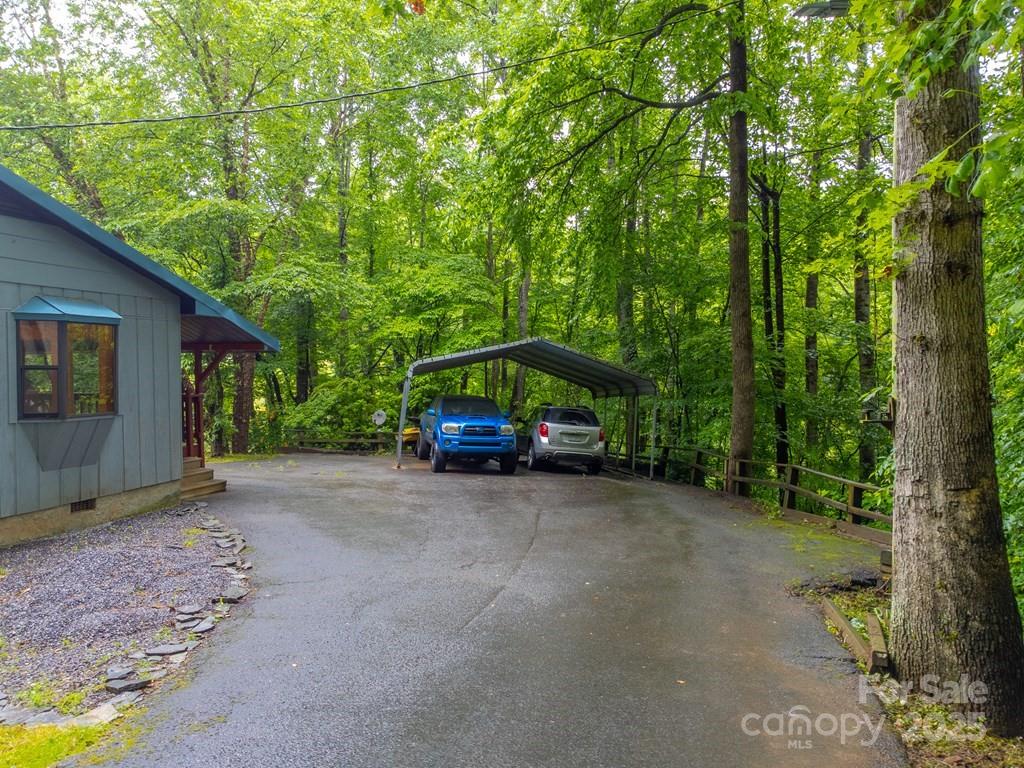 302 Mitchell Road Sylva, NC 28779 - Photo 38 of 48 a view of a car parked in front of a house